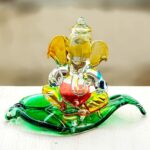 GlassWorld Glass Handicraft Crystal Glass Ganesha on Leaf Murti Idol Statue Sculpture - 2.5"