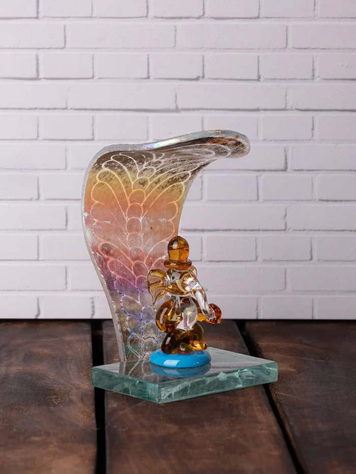 GlassWorld Glass Handicraft Lord Ganesh Idol under Serpent Hood Decorative Showpiece - Available in Assorted Colors