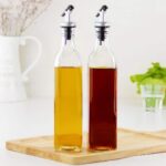GlassWorld Glass Oil Dispenser 1000ml Bottle for Kitchen Metal Leak-Proof Cork Transparent Oil Pourer and Holder