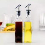 GlassWorld Glass Oil Dispenser 500ml Bottle for Kitchen Metal Leak-Proof Cork Transparent Oil Pourer and Holder