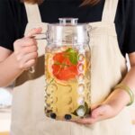 GlassWorld Premium Concave Round Glass Water Jug with Plastic Lid & Handle, Pitcher for Serve Water, Milk, Juice, Beverage, Cocktail